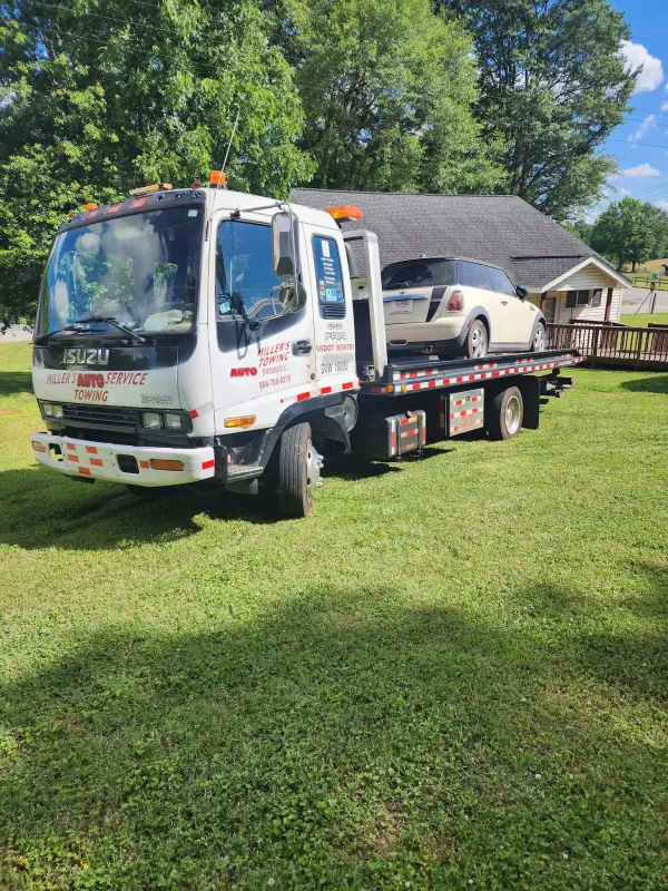 Miller's Towing And Roadside Asst. CHEAPEST TOWING IN TOWN $65.00 & UP AS WELL AS ROADSIDE ASST. AND MUCH MORE .. - photo 3
