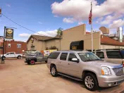 POWELL'S AUTO BODY, INC.