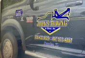 JOHN'S TOWING & SONS INC.