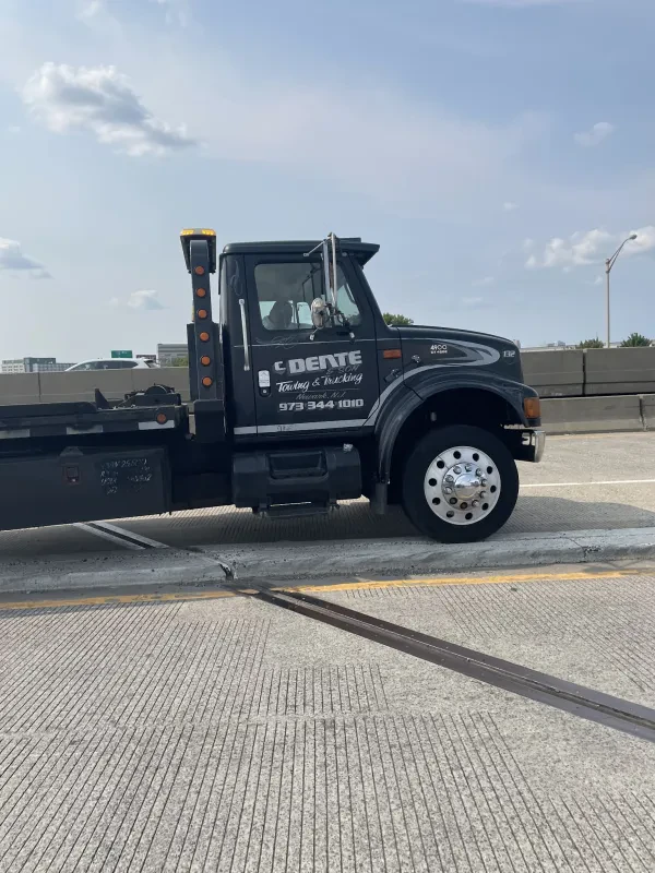 C. DENTE TOWING & CARTING - photo 3